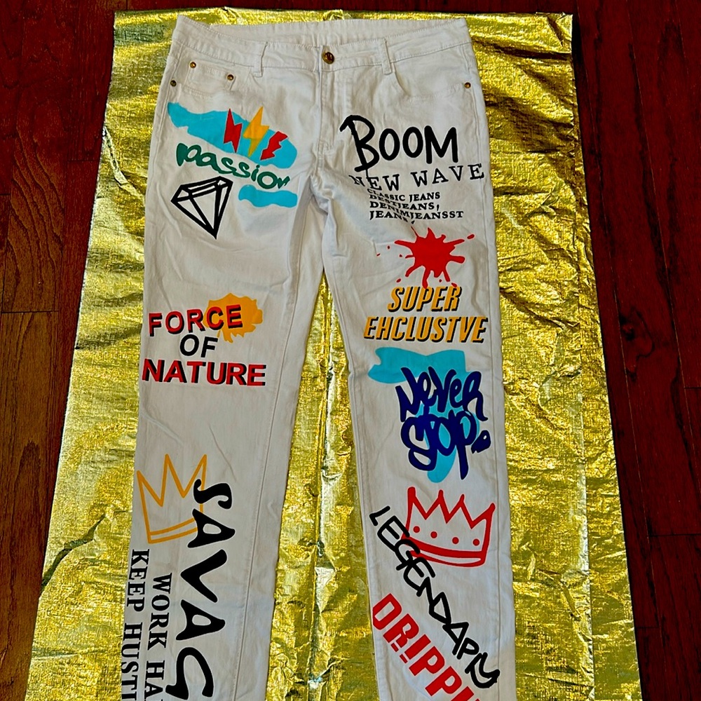 White jeans with colorful designs.